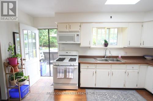 25725 Maple Beach Road, Brock, ON - Indoor Photo Showing Kitchen With Double Sink