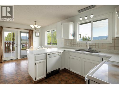 Bright & Functional - 5826 Bartlett Road, Vernon, BC - Indoor Photo Showing Kitchen With Double Sink