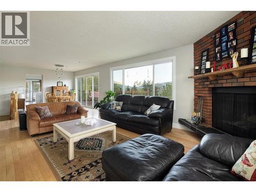 5826 Bartlett Road, Vernon, BC - Indoor Photo Showing Living Room With Fireplace