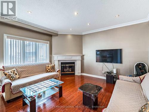 26 Tangleridge Boulevard, Brampton, ON - Indoor Photo Showing Living Room With Fireplace