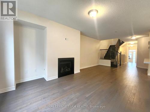 209 Hartsmere Drive, Ottawa, ON - Indoor Photo Showing Living Room With Fireplace