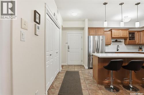 207 615 Saskatchewan Crescent W, Saskatoon, SK - Indoor Photo Showing Kitchen With Stainless Steel Kitchen