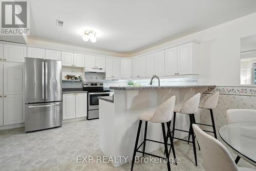 511 - 245 Elgin Street W, Cobourg, ON - Indoor Photo Showing Kitchen With Upgraded Kitchen