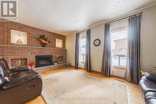 19 Hadeland Avenue, Hamilton, ON - Indoor Photo Showing Living Room With Fireplace