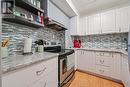 310 - 65 Silvercreek Parkway N, Guelph (Junction/Onward Willow), ON  - Indoor Photo Showing Kitchen With Upgraded Kitchen 