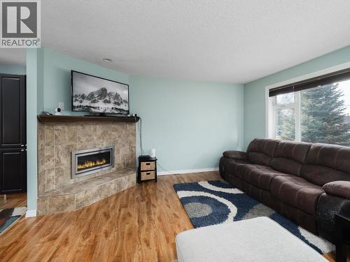 3054 Poyner Crescent, Prince George, BC - Indoor Photo Showing Living Room With Fireplace