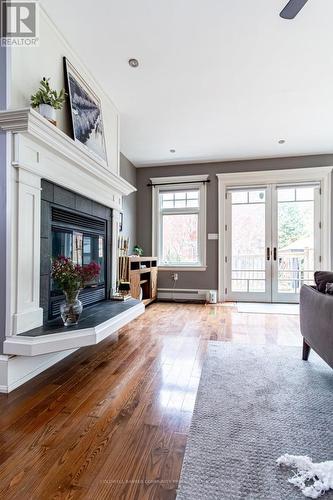 34 Holton Avenue S, Hamilton, ON - Indoor Photo Showing Living Room With Fireplace
