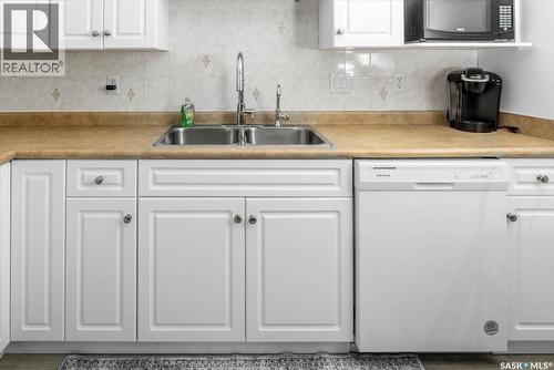 108 2300 Tell Place, Regina, SK - Indoor Photo Showing Kitchen With Double Sink