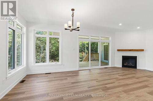 101 Alcock Drive, Beckwith, ON - Indoor Photo Showing Living Room With Fireplace
