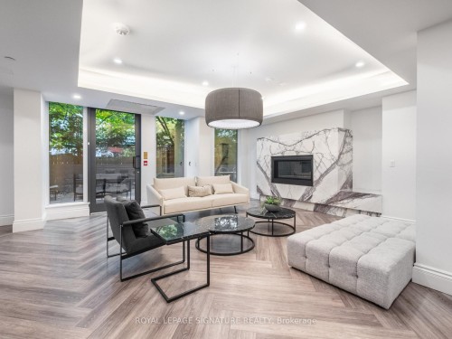 504-128 Pears Avenue, Toronto, ON - Indoor Photo Showing Living Room With Fireplace