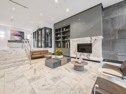 504-128 Pears Avenue, Toronto, ON - Indoor Photo Showing Other Room With Fireplace