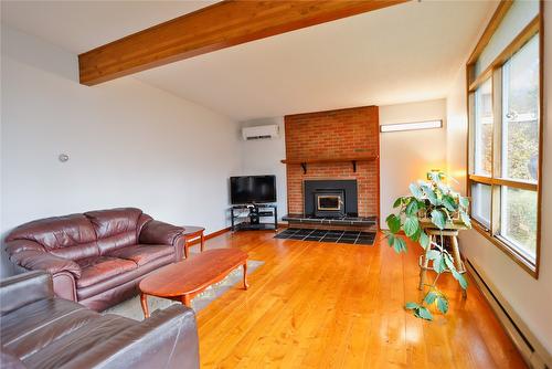 1438 Nichol Road, Revelstoke, BC - Indoor Photo Showing Living Room With Fireplace