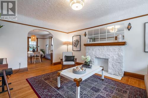 26 Weir Street S, Hamilton, ON - Indoor Photo Showing Living Room With Fireplace