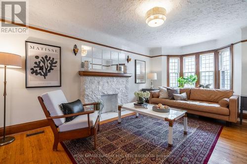 26 Weir Street S, Hamilton, ON - Indoor Photo Showing Living Room With Fireplace