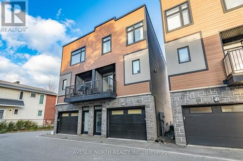 938 Woodroffe Avenue, Ottawa, ON - Outdoor With Balcony With Facade