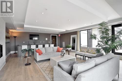 103 - 128 Garden Drive, Oakville, ON - Indoor Photo Showing Living Room With Fireplace