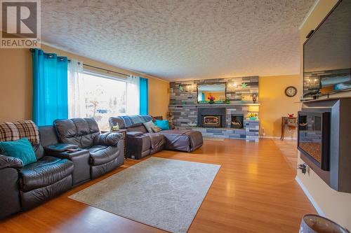 9-11 Pondside Road, Spaniards Bay, NL - Indoor Photo Showing Living Room With Fireplace
