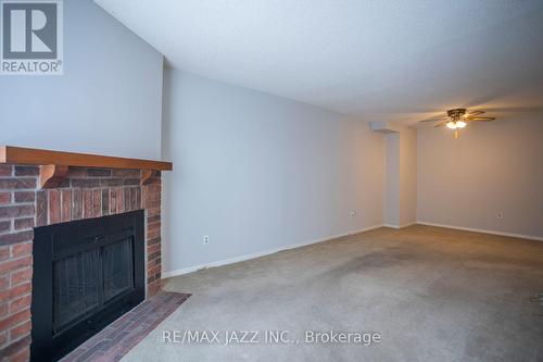 77 Caronia Square, Toronto (Malvern), ON - Indoor With Fireplace