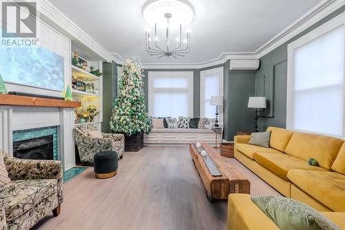 71 Corporal Jamie Murphy Drive, Conception Harbour, NL - Indoor Photo Showing Living Room With Fireplace