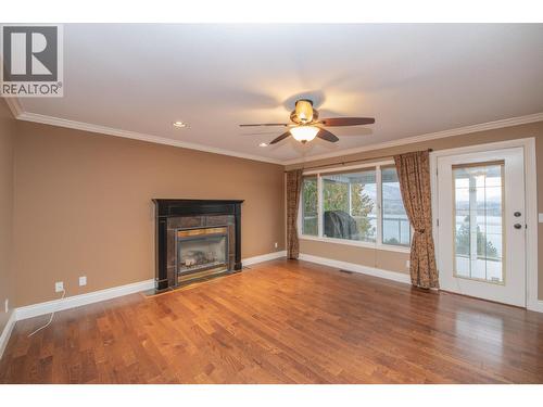 7903 Lakeview Drive, Coldstream, BC - Indoor Photo Showing Living Room With Fireplace