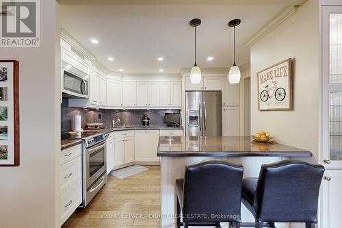 #2005 - 1400 Dixie Road, Mississauga, ON - Indoor Photo Showing Kitchen With Upgraded Kitchen
