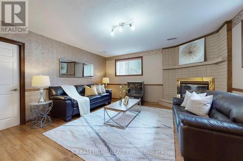 7737 Mount Carmel Boulevard, Niagara Falls, ON - Indoor Photo Showing Living Room With Fireplace