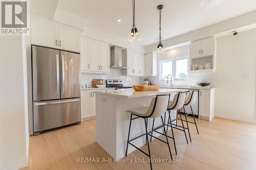 Model Home - Lot 27 166 Dempsey Drive, Stratford, ON - Indoor Photo Showing Kitchen With Upgraded Kitchen