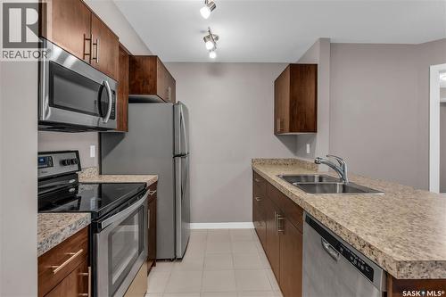 1103 5500 Mitchinson Way, Regina, SK - Indoor Photo Showing Kitchen With Stainless Steel Kitchen With Double Sink