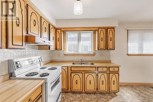 7778 Benavon Road, Mississauga, ON - Indoor Photo Showing Kitchen With Double Sink