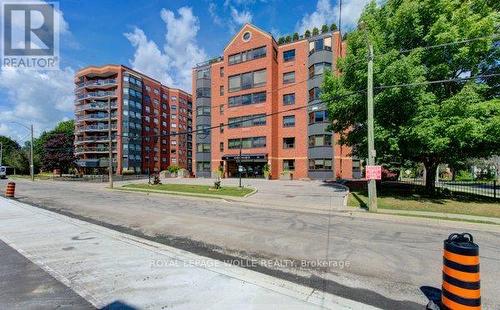 303 - 20 Ellen Street E, Kitchener, ON - Outdoor With Facade