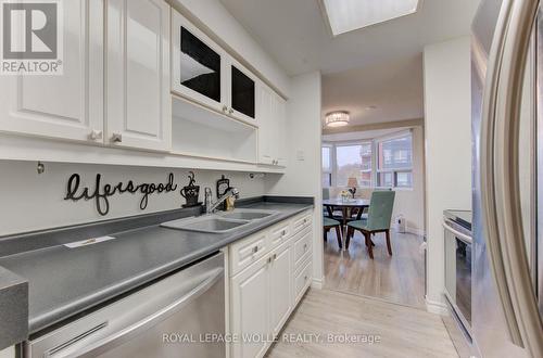 303 - 20 Ellen Street E, Kitchener, ON - Indoor Photo Showing Kitchen With Double Sink