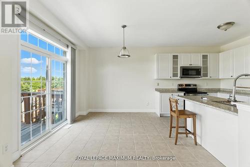 80 Cauthers Crescent, New Tecumseth, ON - Indoor Photo Showing Kitchen With Double Sink