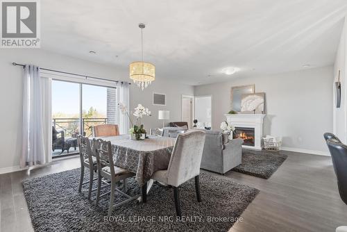 401 - 379 Scott Street, St. Catharines (Vine/Linwell), ON - Indoor Photo Showing Dining Room With Fireplace