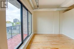 Primary bedroom w/access to balcony - 