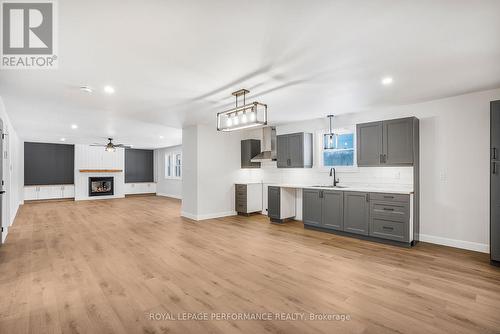 245 300 Route E, The Nation, ON - Indoor Photo Showing Kitchen With Fireplace