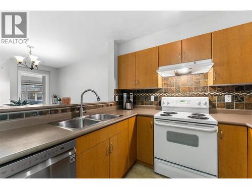 555 Yates Road Unit# 403, Kelowna, BC - Indoor Photo Showing Kitchen With Double Sink