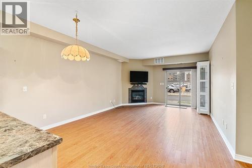 5995 Ellis St Unit# 107, Lasalle, ON - Indoor With Fireplace