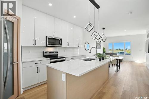 179 1509 Richardson Road, Saskatoon, SK - Indoor Photo Showing Kitchen With Double Sink With Upgraded Kitchen