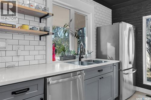114 28Th Street W, Saskatoon, SK - Indoor Photo Showing Kitchen With Stainless Steel Kitchen With Double Sink