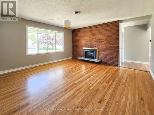 14 Roberta Crescent, Ottawa, ON - Indoor Photo Showing Living Room With Fireplace