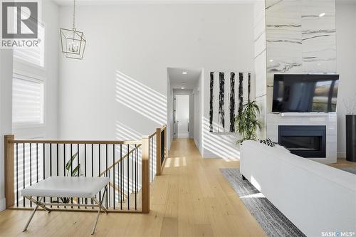 100 Greenbryre Crescent N, Corman Park Rm No. 344, SK - Indoor Photo Showing Other Room With Fireplace