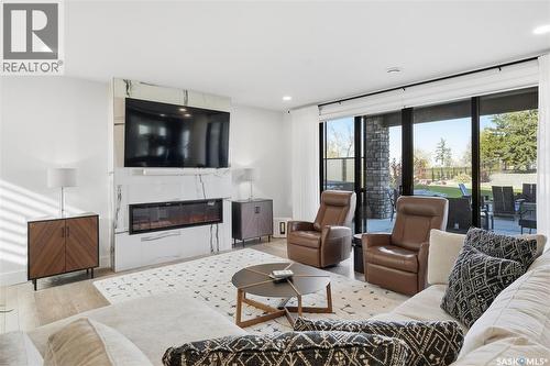 100 Greenbryre Crescent N, Corman Park Rm No. 344, SK - Indoor Photo Showing Living Room With Fireplace