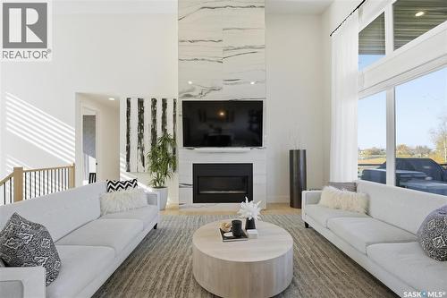 100 Greenbryre Crescent N, Corman Park Rm No. 344, SK - Indoor Photo Showing Living Room With Fireplace