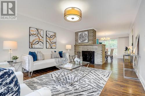 55 Three Valleys Drive, Toronto, ON - Indoor Photo Showing Living Room With Fireplace