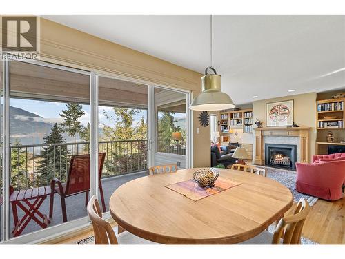 1120 12 Street Ne Unit# 33, Salmon Arm, BC - Indoor Photo Showing Dining Room With Fireplace
