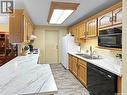 A1 532 River Street, Prince Albert, SK  - Indoor Photo Showing Kitchen With Double Sink 