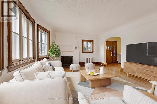this image has been virtually staged - 2 Gladstone Avenue, Smiths Falls, ON - Indoor Photo Showing Living Room