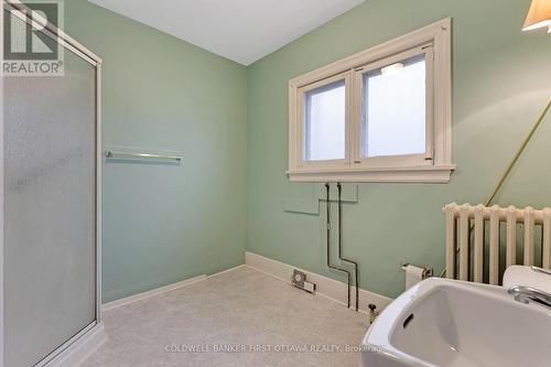 main floor bathroom with laundry hookup - 2 Gladstone Avenue, Smiths Falls, ON - Indoor Photo Showing Bathroom