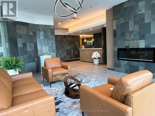 906 - 1030 Sheppard Avenue W, Toronto, ON - Indoor Photo Showing Living Room With Fireplace