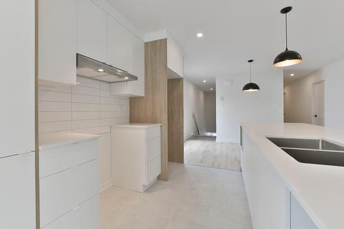 Dwelling - 512  - 516 Rue Tex-Lecor, Saint-Jérôme, QC - Indoor Photo Showing Kitchen With Double Sink